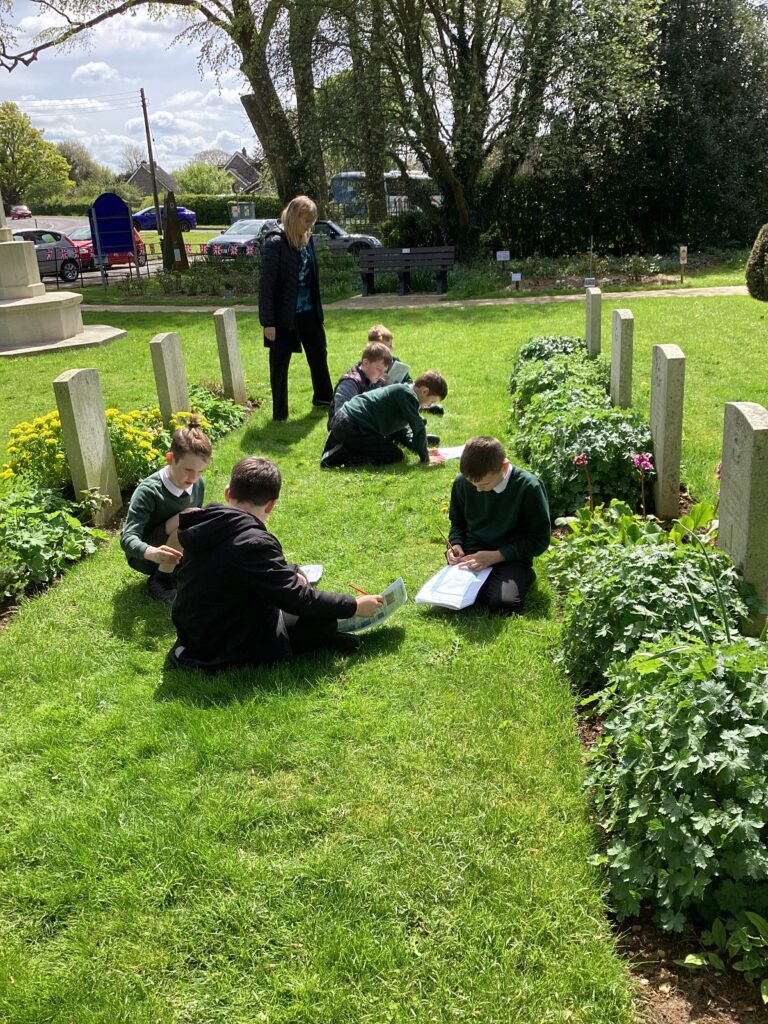 Children research personal stories of war graves personnel